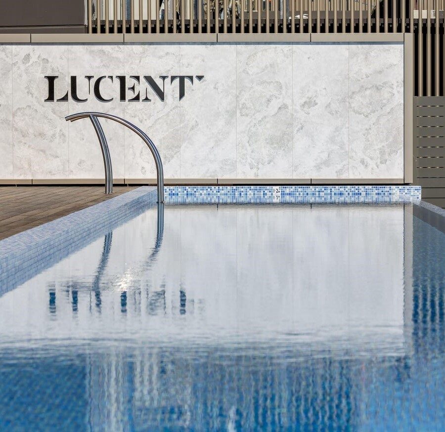 Well maintained swimming pool overlooking city views.