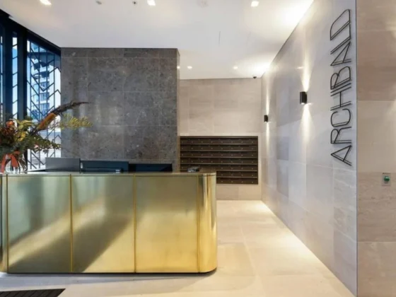 Archibald Residences entry foyer and concierge desk